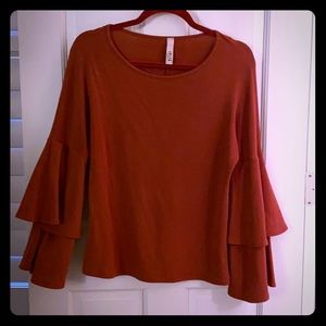 Rustic red long sleeve top
